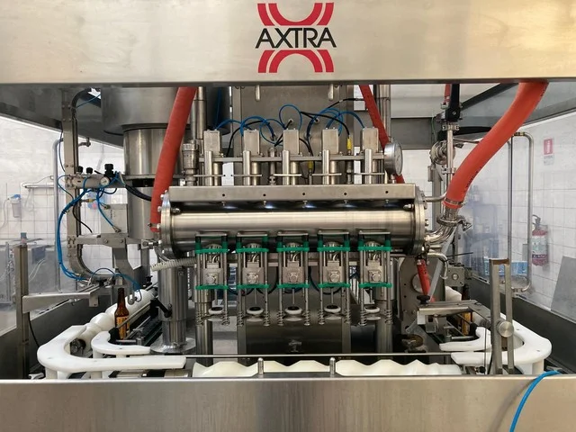 Used Axtra Miniline L-SA1 / L-G5 / L-IV5 / L-CW1 bottling machine Filling Monoblocks - QT 772